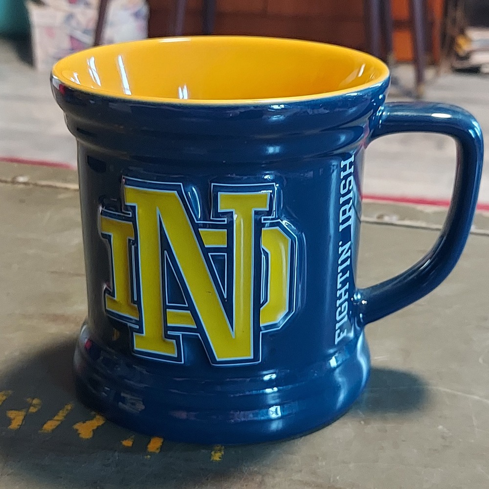 Notre Dame Fightin Irish Coffee Mug Navy Blue Yellow Embossed ND Encore Group